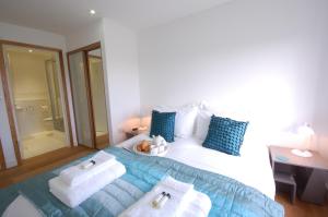 En eller flere senge i et værelse på Seal Cove