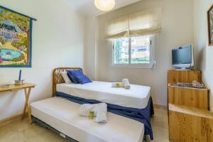 Postel nebo postele na pokoji v ubytování CT 187 - Calanova Golf Suite