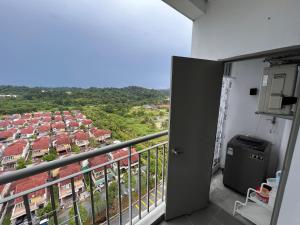 a balcony with a view of a city at Urban Gateway Homestay# Bangi#Wifi 300Mbps#Netflix in Kampong Tangkas