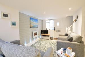 Χώρος καθιστικού στο The Smokehouse Cottage