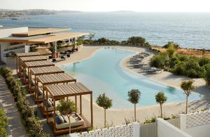 an aerial view of a resort with a swimming pool at PAROCKS Luxury Hotel & Spa in Ambelas