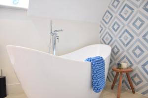 Vannituba majutusasutuses Arlo Cottage, Orford +18 fotot