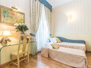 Кровать или кровати в номере Il Gattopardo Relais
