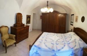 A bed or beds in a room at A ca' du Risso - Appartamento - Sea & outdoor for families, bikers and climbers