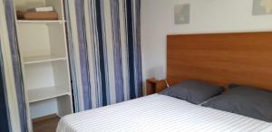 Postel nebo postele na pokoji v ubytování Pavillon, de 4 à 7 couchages, dans une superbe résidence avec piscine + 16 fotografií