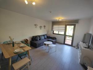 Część wypoczynkowa w obiekcie Corralejo Happy Place, precioso apartamento con piscina