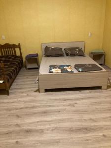 Postel nebo postele na pokoji v ubytování Guest House Econom