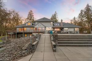 a large house with a staircase in front of it at The Gaard House in Carlton