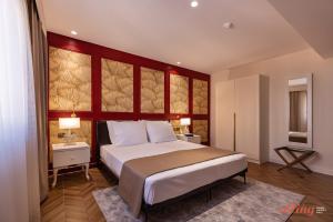 Letto o letti in una camera di El Doris Boutique Living