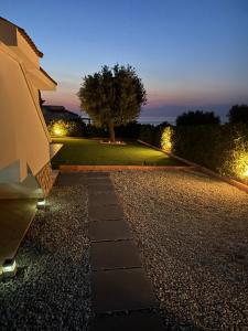 A garden outside Villa NOVE - Residence dei Fiori