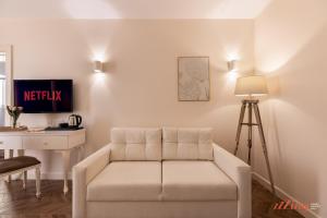 TV o dispositivi per l'intrattenimento presso El Doris Boutique Living