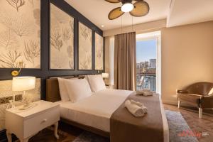 Letto o letti in una camera di El Doris Boutique Living