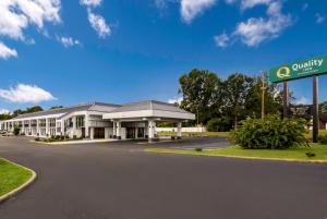 a view of a hotel with a sign in front of it at Quality Inn in Emporia