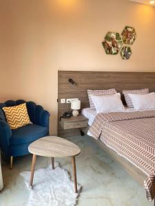 Katil atau katil-katil dalam bilik di Flock Hotel I Golf Course Road Near Dlf Phase 1 Metro station I Gurugram