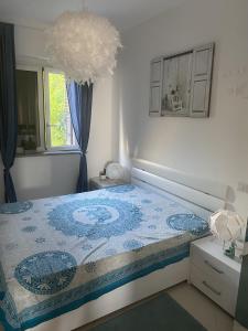 Katil atau katil-katil dalam bilik di Villa NOVE - Residence dei Fiori