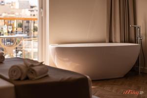 Letto o letti in una camera di El Doris Boutique Living