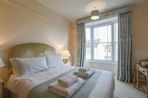 Ένα ή περισσότερα κρεβάτια σε δωμάτιο στο Walton House, Southwold