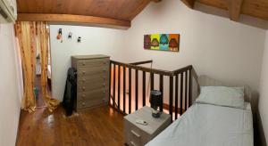 Posteľ alebo postele v izbe v ubytovaní La casa di “Nedda”
