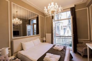 Postel nebo postele na pokoji v ubytování Triada Hotel Taksim - Special Category