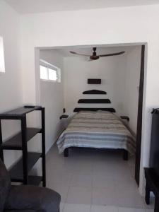 A bed or beds in a room at Loft 101, Céntrico, Bonito, Equipado wifi