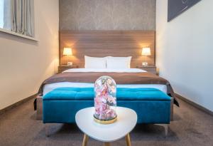 Voodi või voodid majutusasutuse Veneti Suites toas