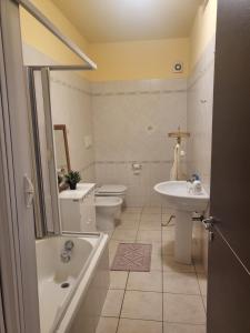 Koupelna v ubytování Casa di Ninni + 11 fotografií