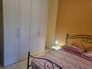 Postel nebo postele na pokoji v ubytování Casa di Ninni