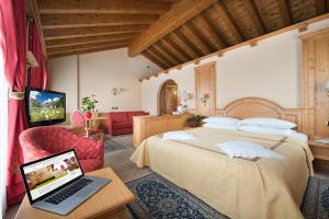TV a/nebo společenská místnost v ubytování Hotel Valtellina