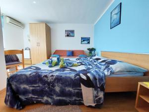 Posteľ alebo postele v izbe v ubytovaní Rooms Anchy