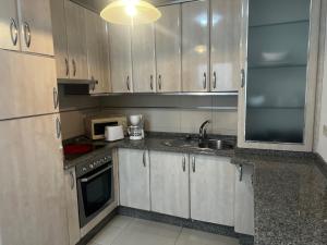 Kuchyňa alebo kuchynka v ubytovaní Apartamentos Redondela - Centro histórico