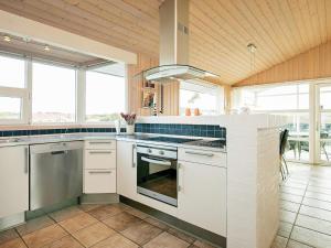 A kitchen or kitchenette at 4 star holiday home in Vejers Strand