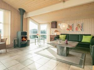 A seating area at 4 star holiday home in Vejers Strand