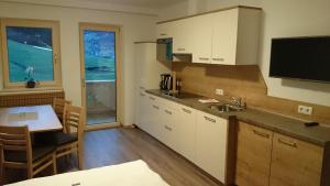 Eldhús eða eldhúskrókur á Apart Geisler