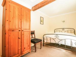 Ένα ή περισσότερα κρεβάτια σε δωμάτιο στο Byre Cottage 3 +36 φωτογραφίες