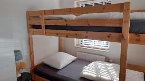 Postel nebo postele na pokoji v ubytování Vakantiebungalow Otterlo + 17 fotografií