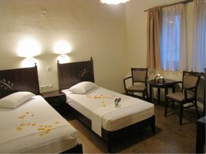 Postel nebo postele na pokoji v ubytování Hotel Mirovoli