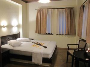 Postel nebo postele na pokoji v ubytování Hotel Mirovoli