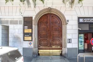The facade or entrance of Milano City Apartments - Duomo Brera - Elegant Suite in Design District