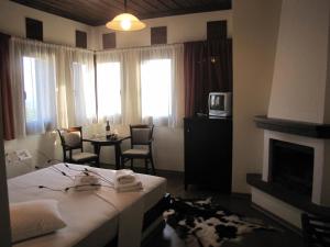 Postel nebo postele na pokoji v ubytování Hotel Mirovoli