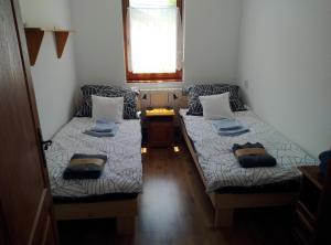Postel nebo postele na pokoji v ubytování Tornácos Vendégház