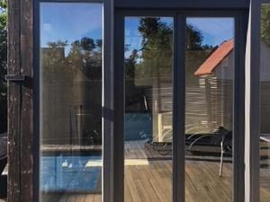 a sliding glass door with a view of a patio at 4 person holiday home in MALM in Malmö