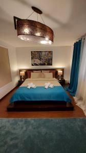 Un pat sau paturi într-o cameră la Ambiennt