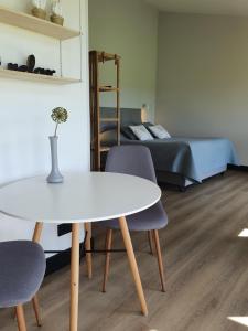 Postel nebo postele na pokoji v ubytování Hippe Schuur