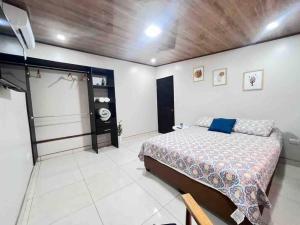 Ein Bett oder Betten in einem Zimmer der Unterkunft Departamento H González 2