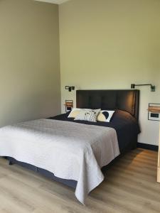 Postel nebo postele na pokoji v ubytování Hippe Schuur