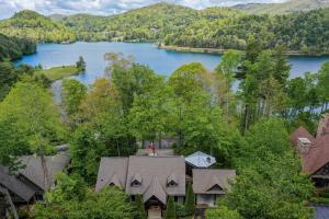 an aerial view of a house and a lake at Incredible Lake Glenville Views Cashiers Home in Cashiers