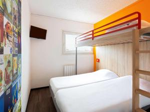 Letto o letti in una camera di Hôtel F1 Reims Tinqueux