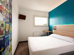 Letto o letti in una camera di Hôtel F1 Reims Tinqueux