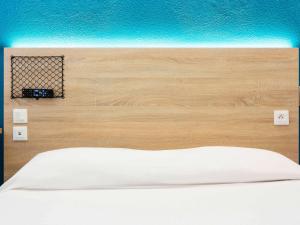 Letto o letti in una camera di Hôtel F1 Reims Tinqueux