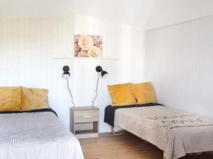 Katil atau katil-katil dalam bilik di Holiday home Slagelse XXXVI